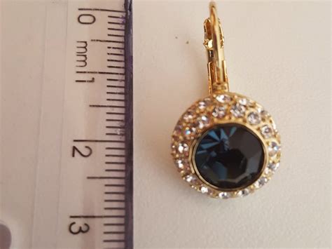 Comprar Brinco Com Corrente Que Prende Barato&nbsp;Preço